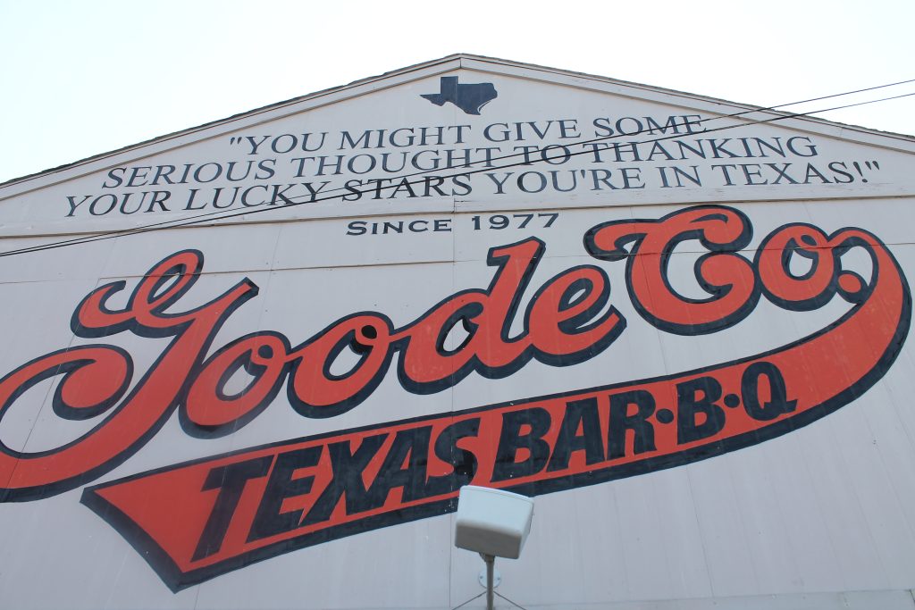 Wide shot of original Kirby Drive location exterior restaurant sign.